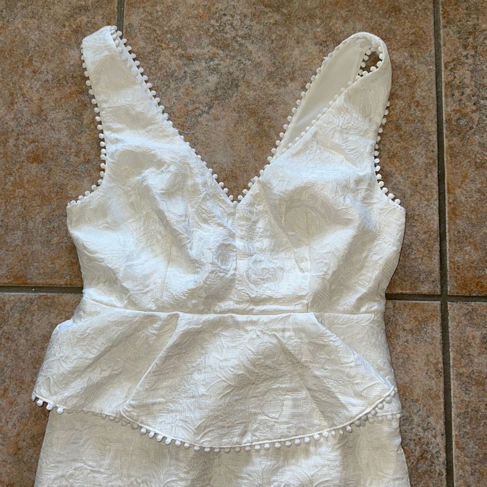 Beautiful white peplum dress from lulus